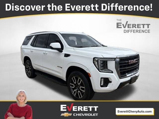 2024 GMC Yukon AT4 in Summit White — front three-quarter view