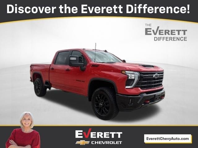 2026 Chevrolet Silverado 2500 HD LT in Red Hot — front three-quarter view