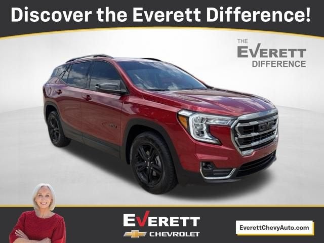 2023 GMC Terrain AT4 in Volcanic Red Tintcoat — front three-quarter view